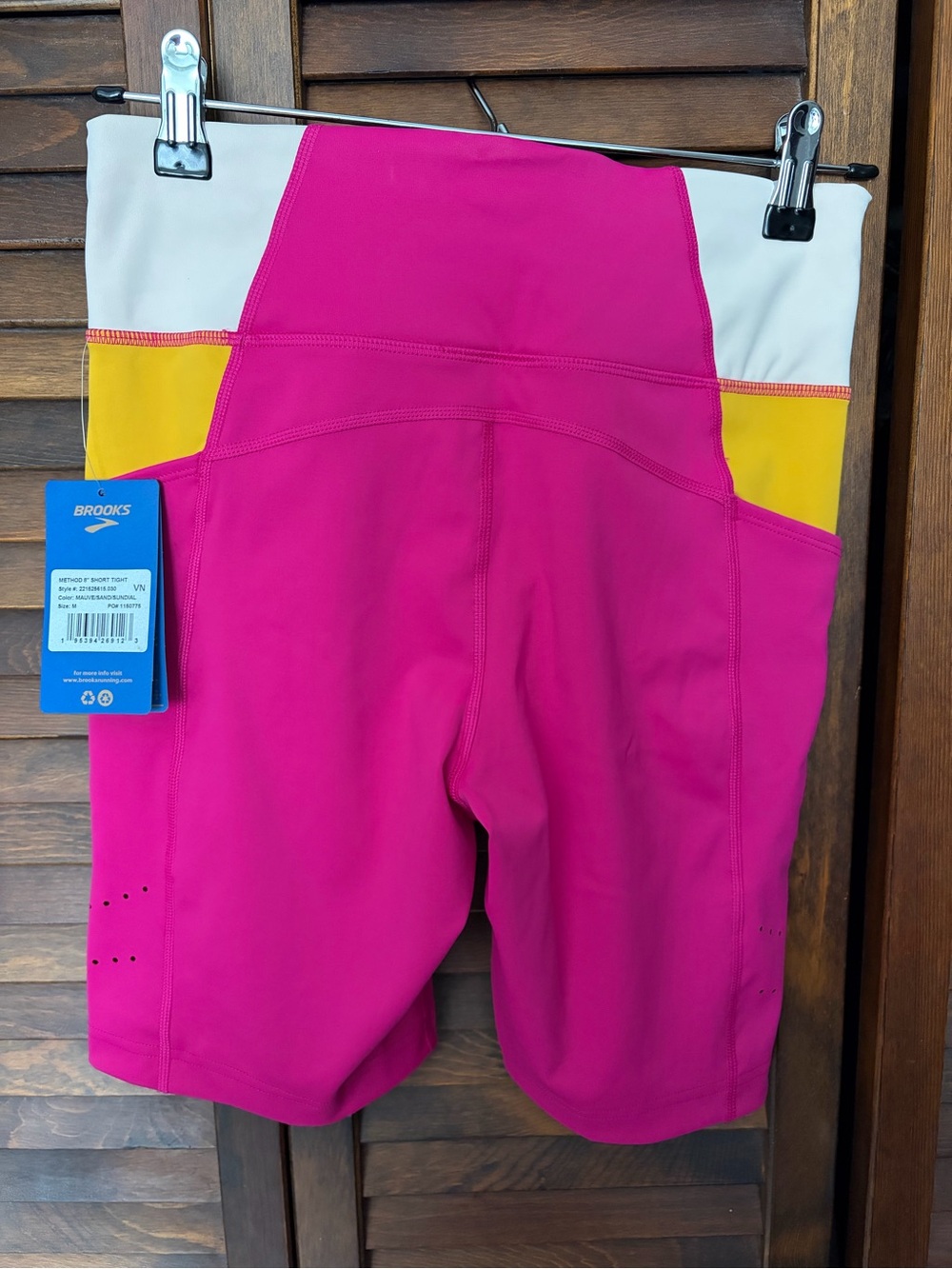 Brooks Women’s Bright Pink Bike Shorts with Yellow Pocket Panels and Cream Waist - Picture 2 of 2
